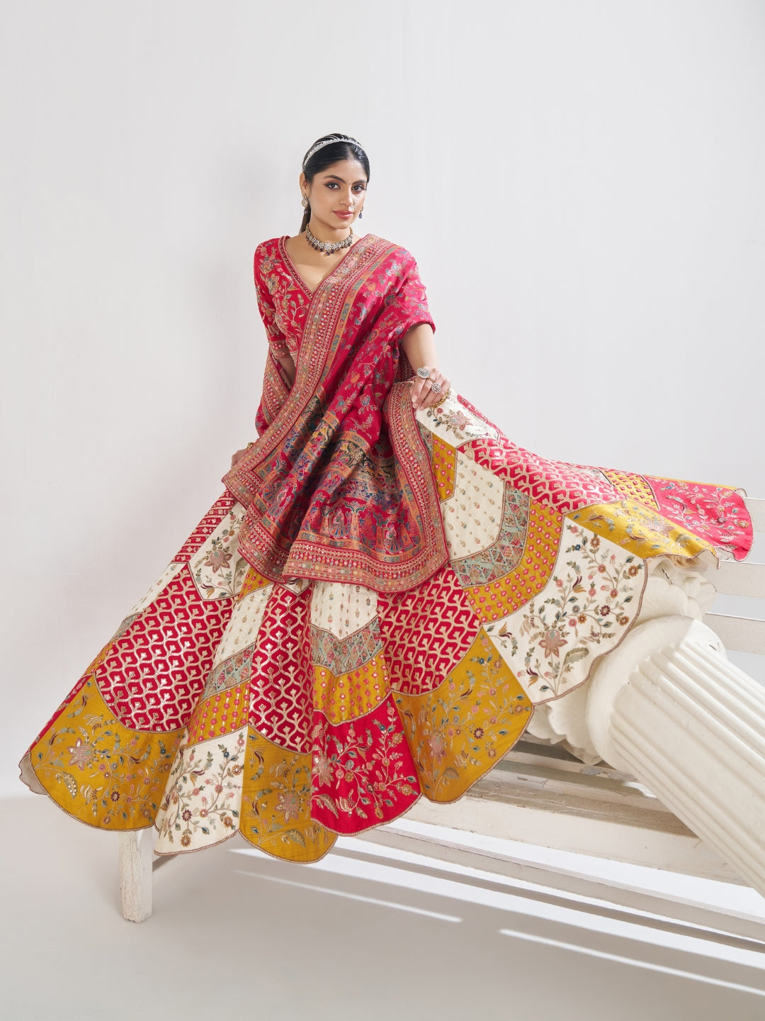 Brocade patchwork lehenga choli with zari, thread embroidery and Banarasi woven dupatta.