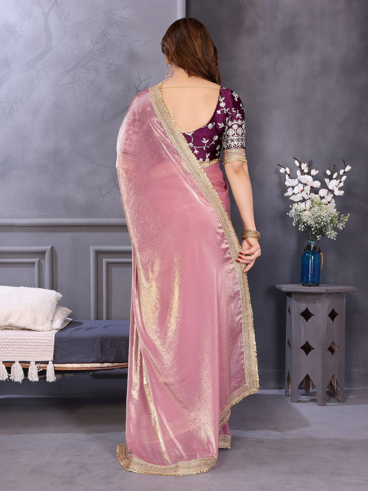 Shimmer solid saree with embellished border & contrast floral embroidered blouse.