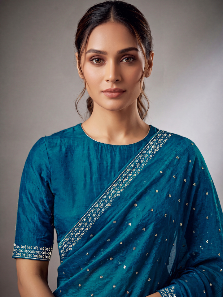 Sequin Embellished Saree with Floral Border and Embroidered Blouse Peice