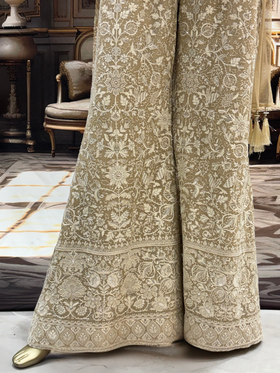 Ivory all-over thread embroidered kurta palazzo set with sequins and tasselled dupatta.