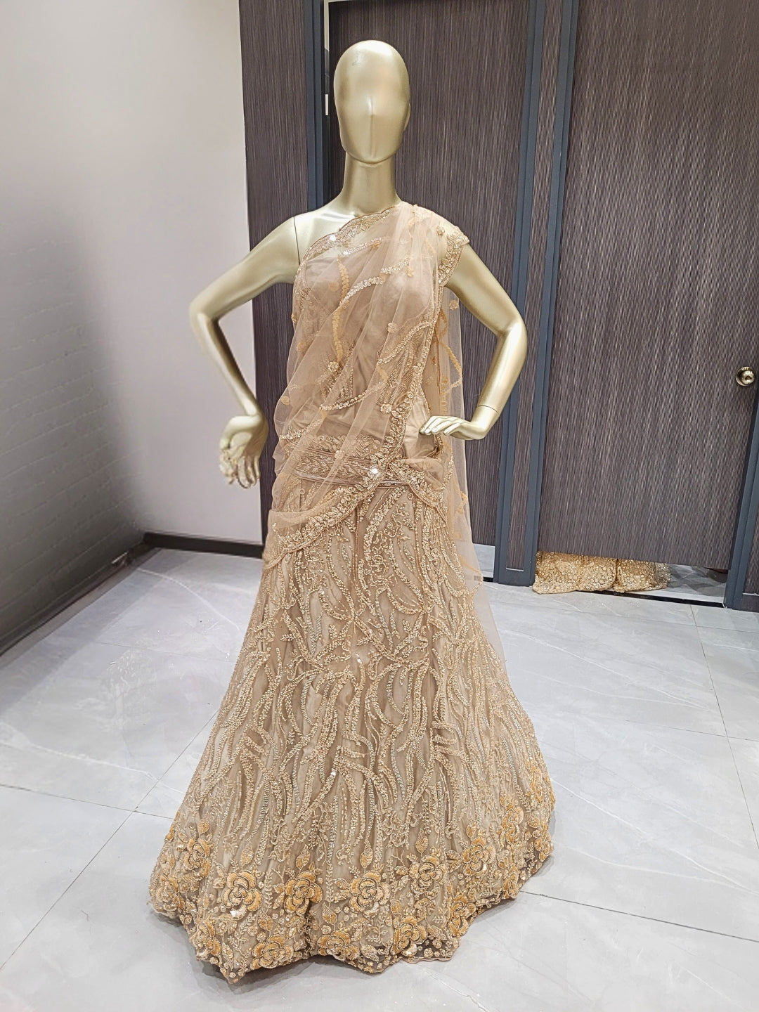 Golden Sequined Embroidered Net Lehenga with Floral and Zari Work