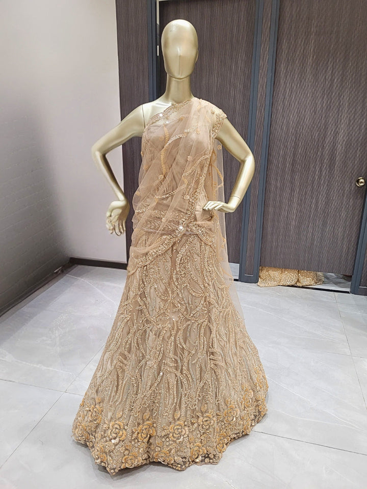 Golden Sequined Embroidered Net Lehenga with Floral and Zari Work