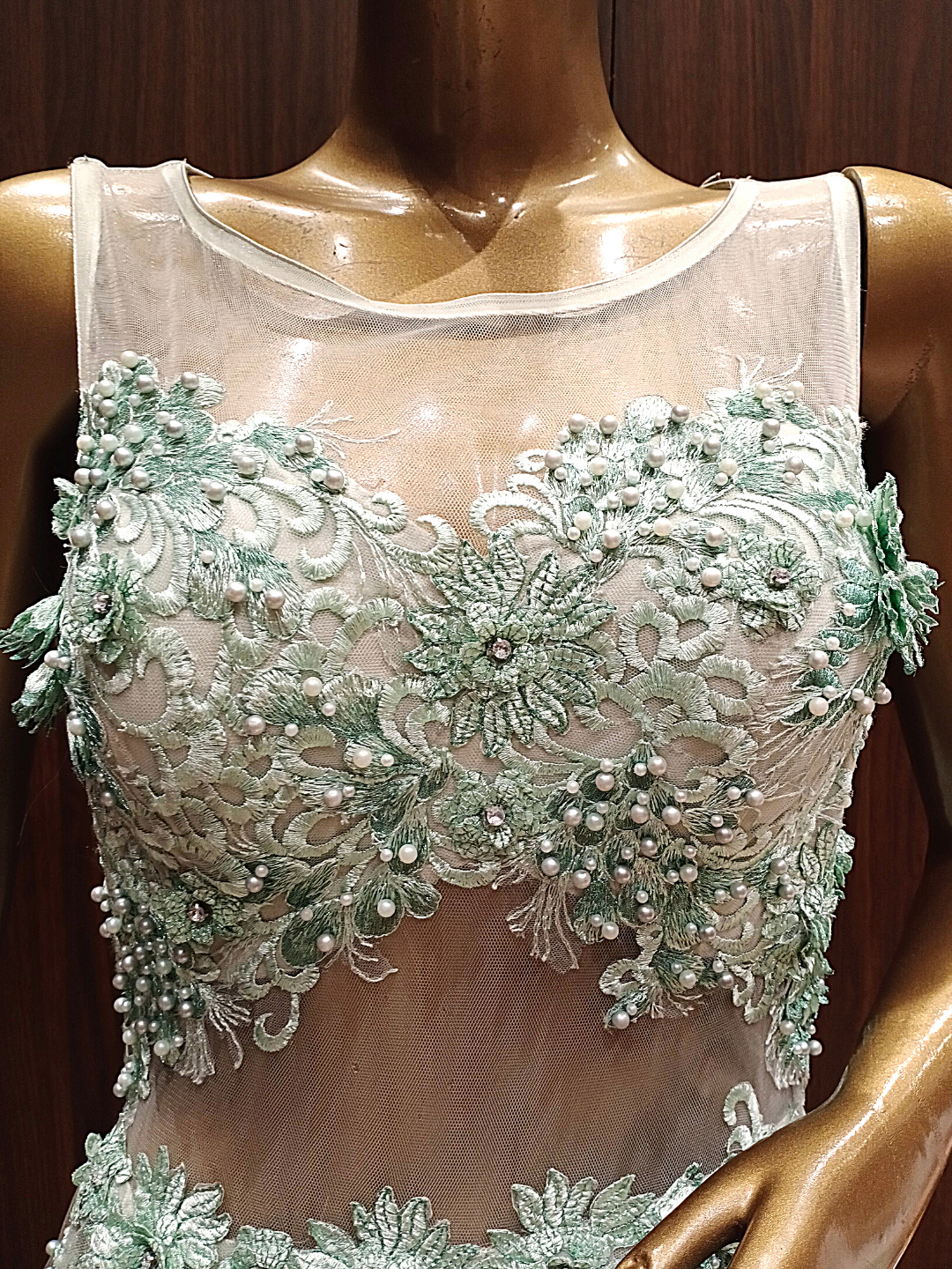 Pastel Green Ruffled Net Gown with Pearl,Thread Embroidery and Layering