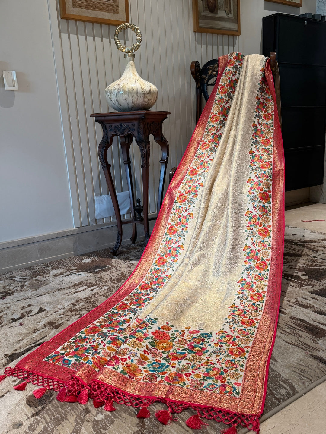 Cream Saree with Multicolour Floral Woven Panels, Red Zari Border & Tassel Pallu