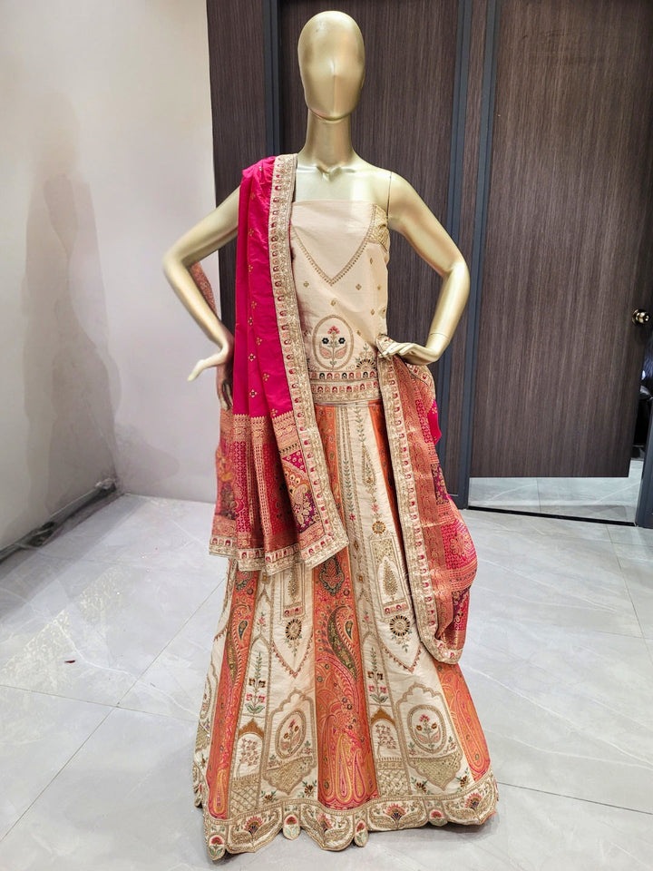 Ivory Orange Silk Lehenga with Pink Dupatta & Zari Embroidery Detailing