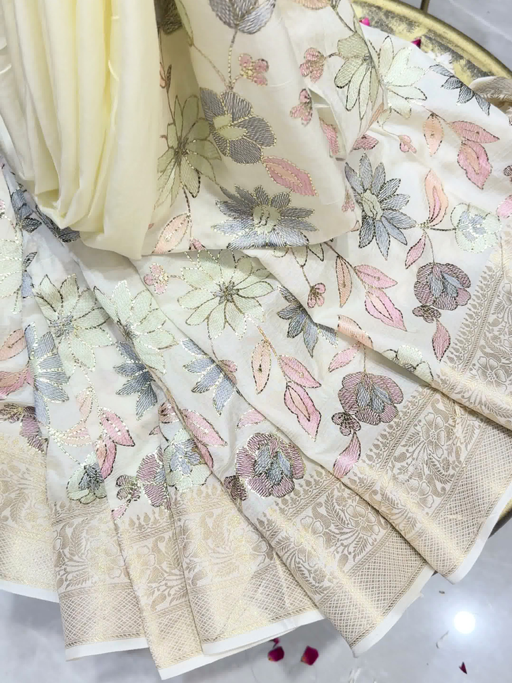 Off White Banarasi Silk Saree with Floral Embroidery and Zari Woven Border