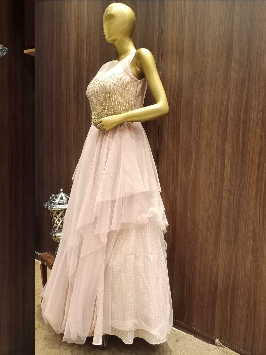Rose Gold Flared Net Gown With Ruffled Layering & Floral Sequence Embroidery