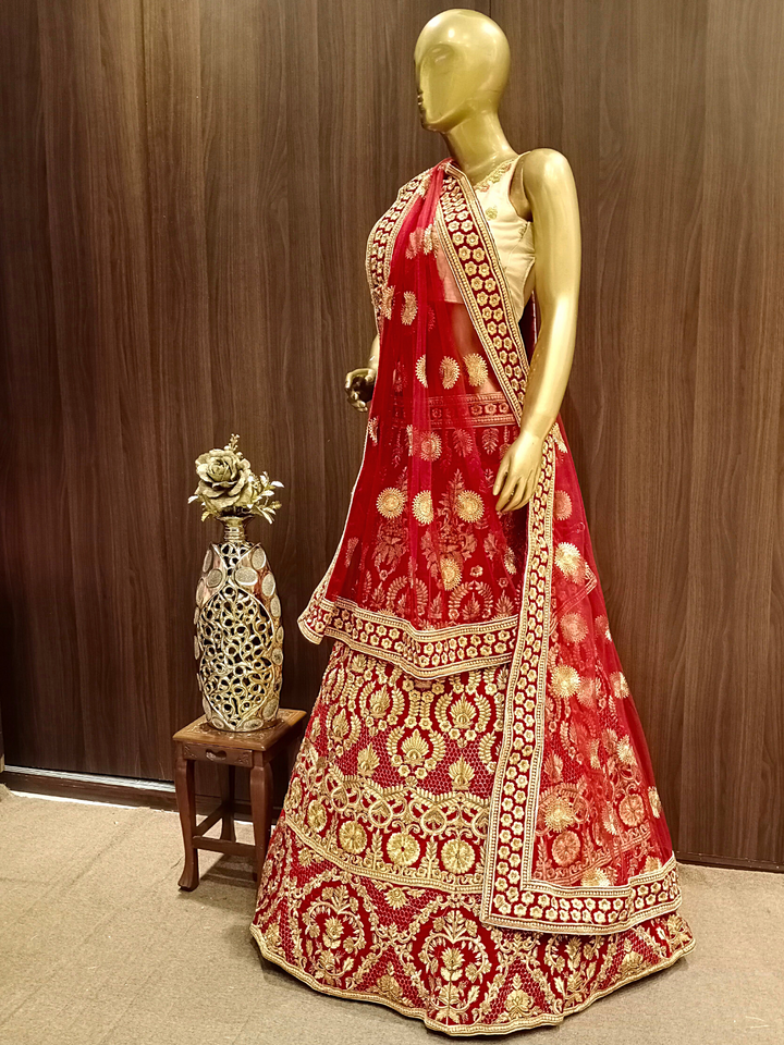 Heavy Ornate Semi-stitched Bridal Lehenga with Gold Zari ,Kundan Embroidery