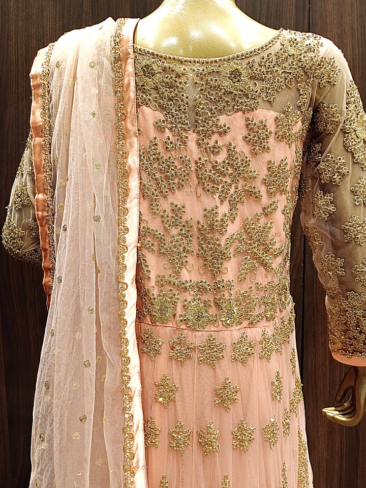 Peach Net Heavy Front Back Embroidered Anarkali with 24 kalis & Dupatta