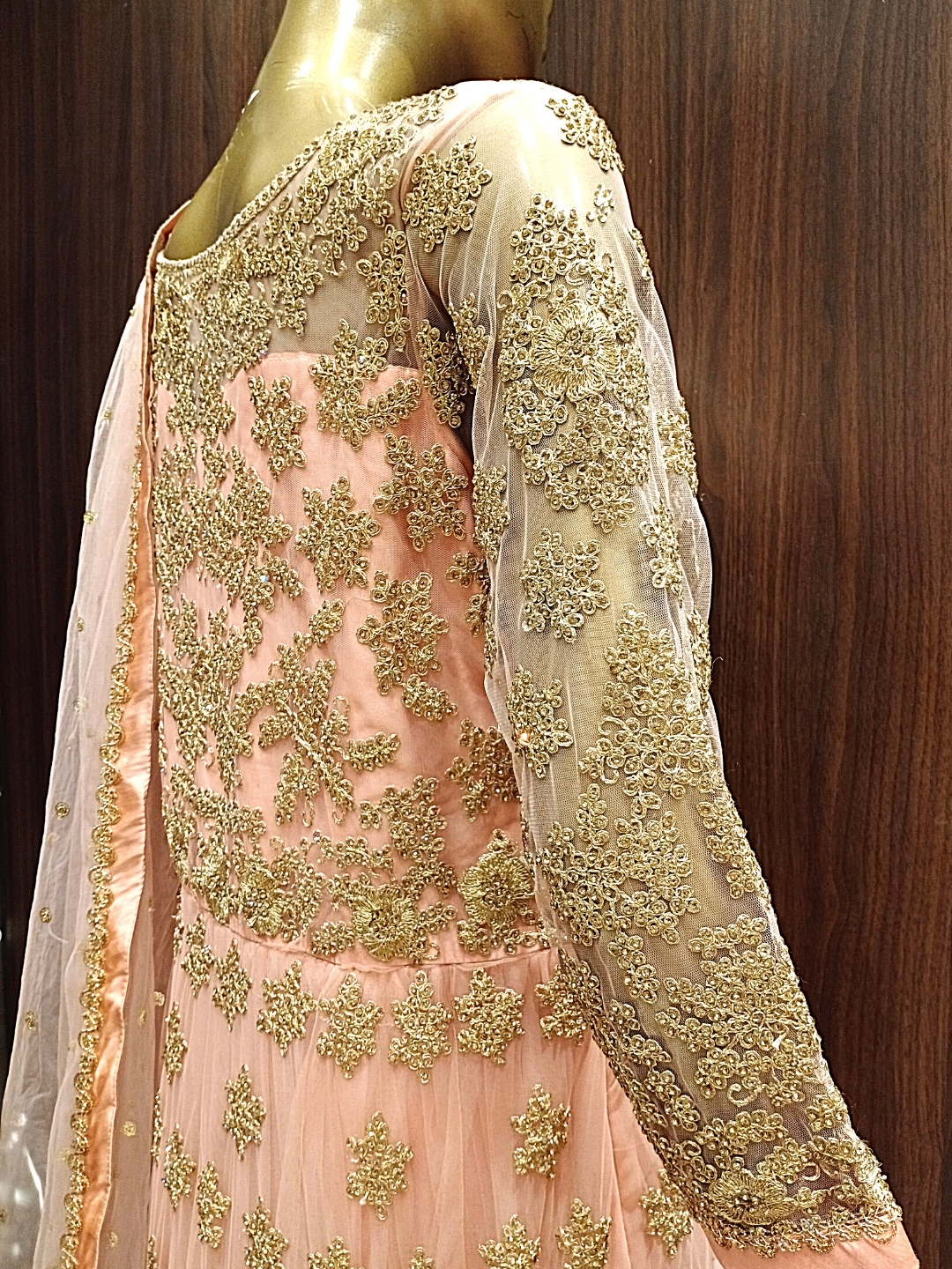 Peach Net Heavy Front Back Embroidered Anarkali with 24 kalis & Dupatta