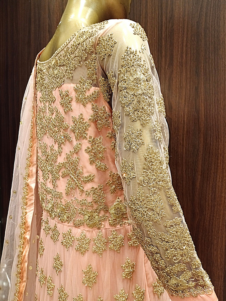 Peach Net Heavy Front Back Embroidered Anarkali with 24 kalis & Dupatta
