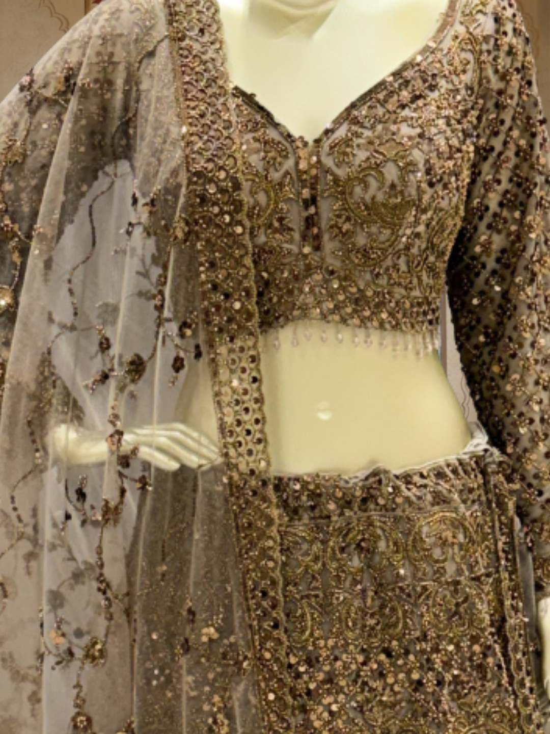 Olive Gold Net Bridal Lehenga Choli with Heavy Zari, Sequin & Mirror Work Embroidery with Crystal Tassel Hem & Net Dupatta