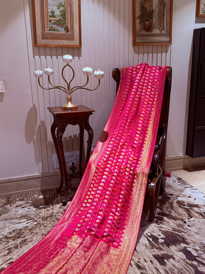 Pink Banarasi Saree with All-over Gold Zari Buta and Dual-Tone Geometric Woven Border