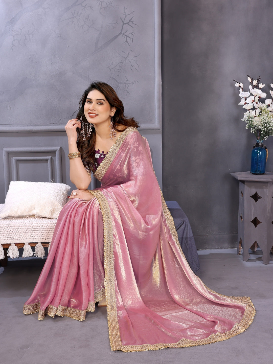 Shimmer solid saree with embellished border & contrast floral embroidered blouse.