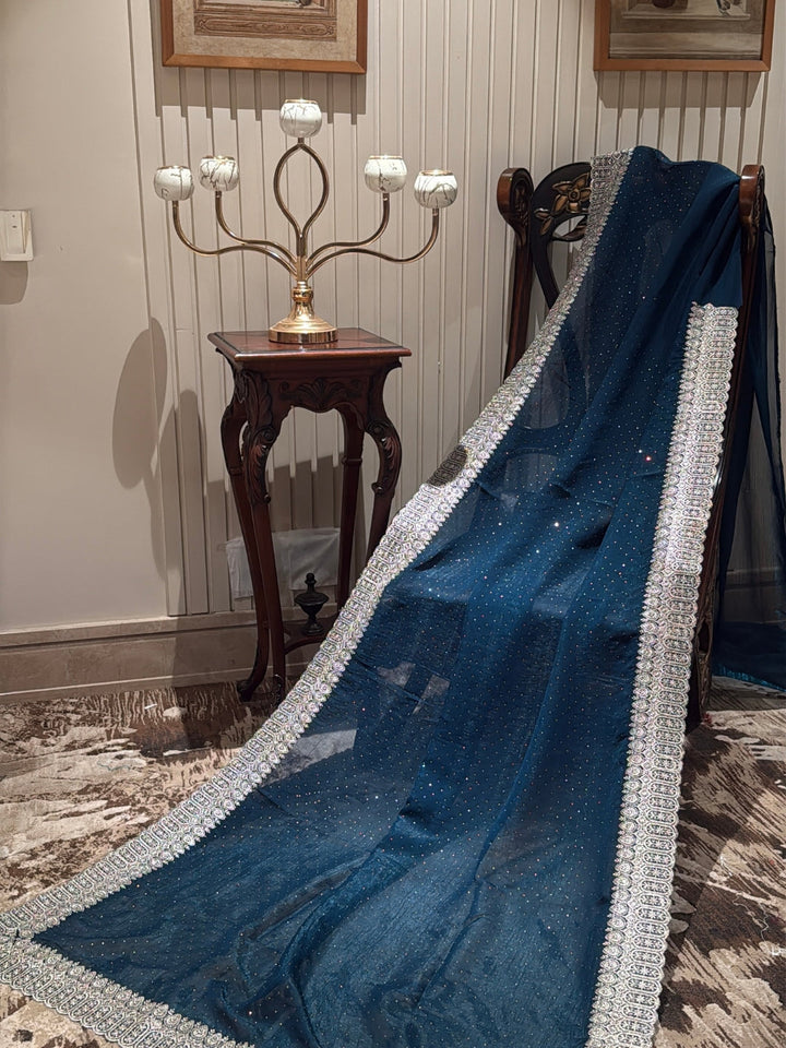 Teal Blue Shimmer Saree with All-Over Silver Sequin Scatter & Intricate Embroidered Border