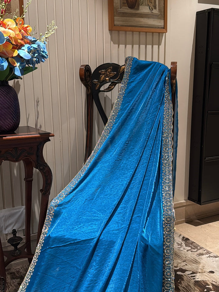 Shimmer Georgette Saree with Intricate Silver-Blue Sequin Embroidered Border