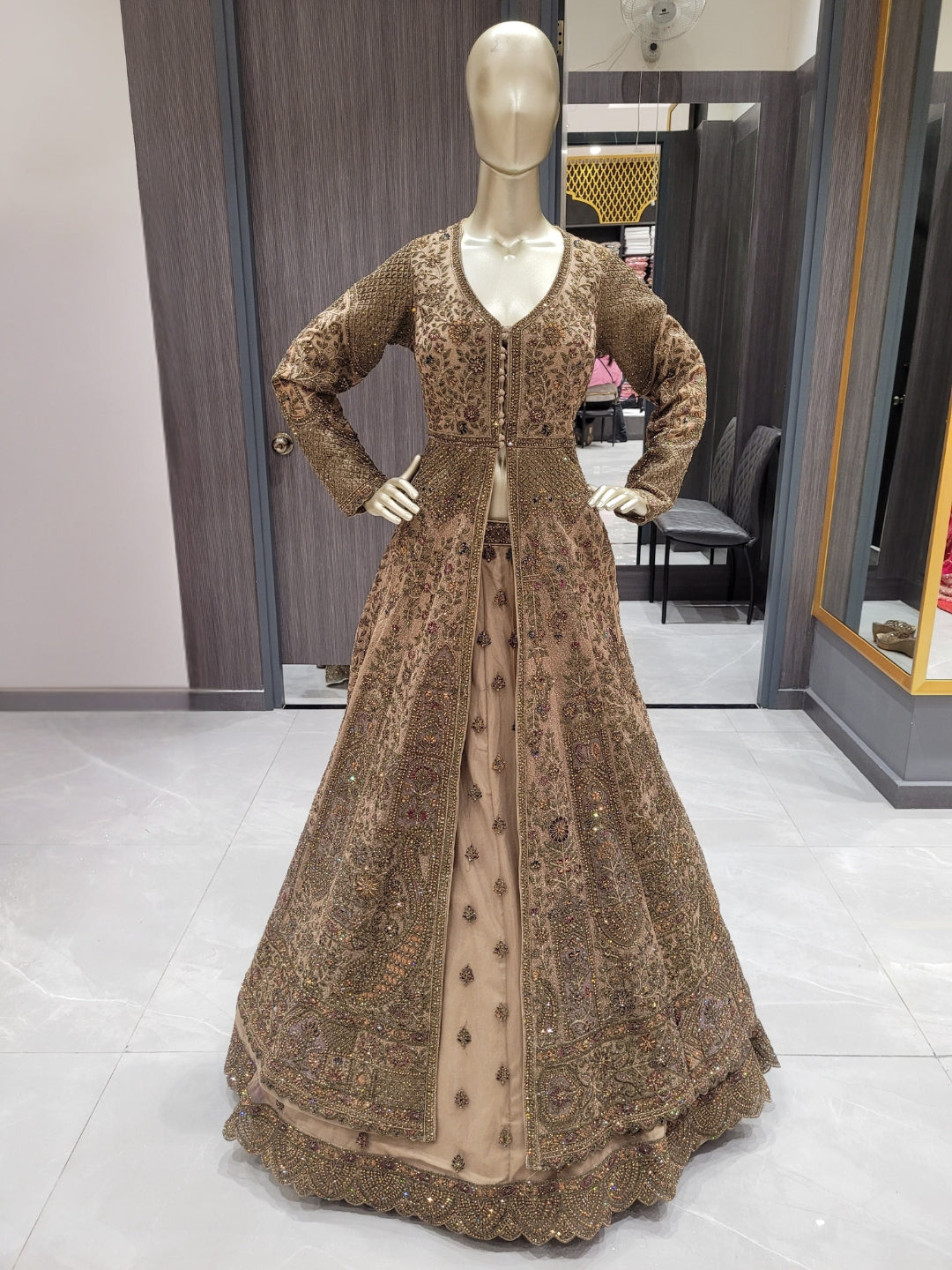 Antique Gold Zardozi Embroidered Long Jacket Gown with Intricate Detailing Antique Gold Zardozi Embroidered Long Jacket Gown with Intricate Detailing