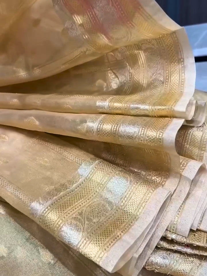 Beige color Beads & Stones Worked Border with Ethnic Motifs Zari woven traditional saree