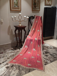 Peach-Pink Shimmer Saree with Golden Sequin Floral Motifs & Heavy Embellished Border