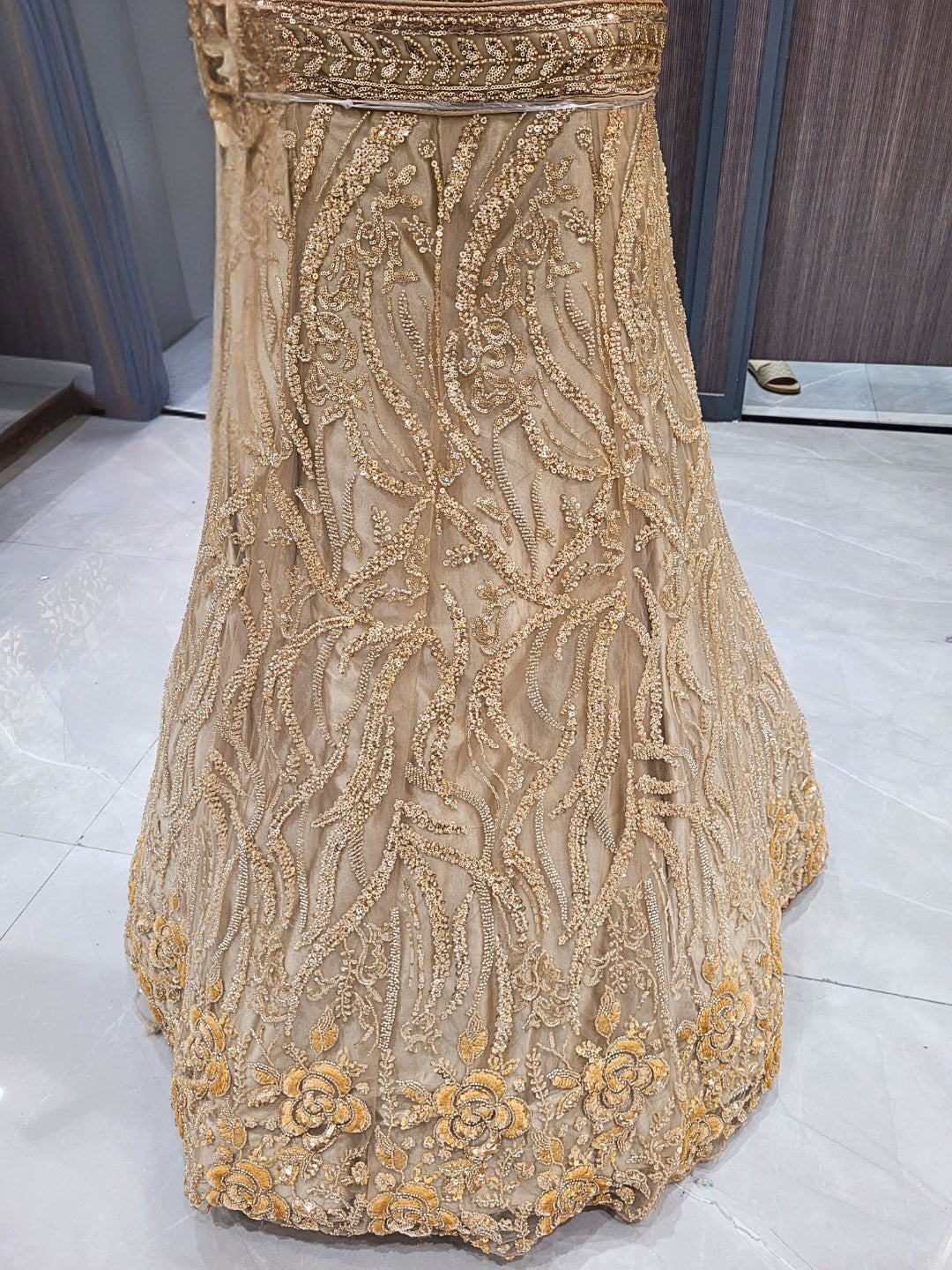 Golden Sequined Embroidered Net Lehenga with Floral and Zari Work