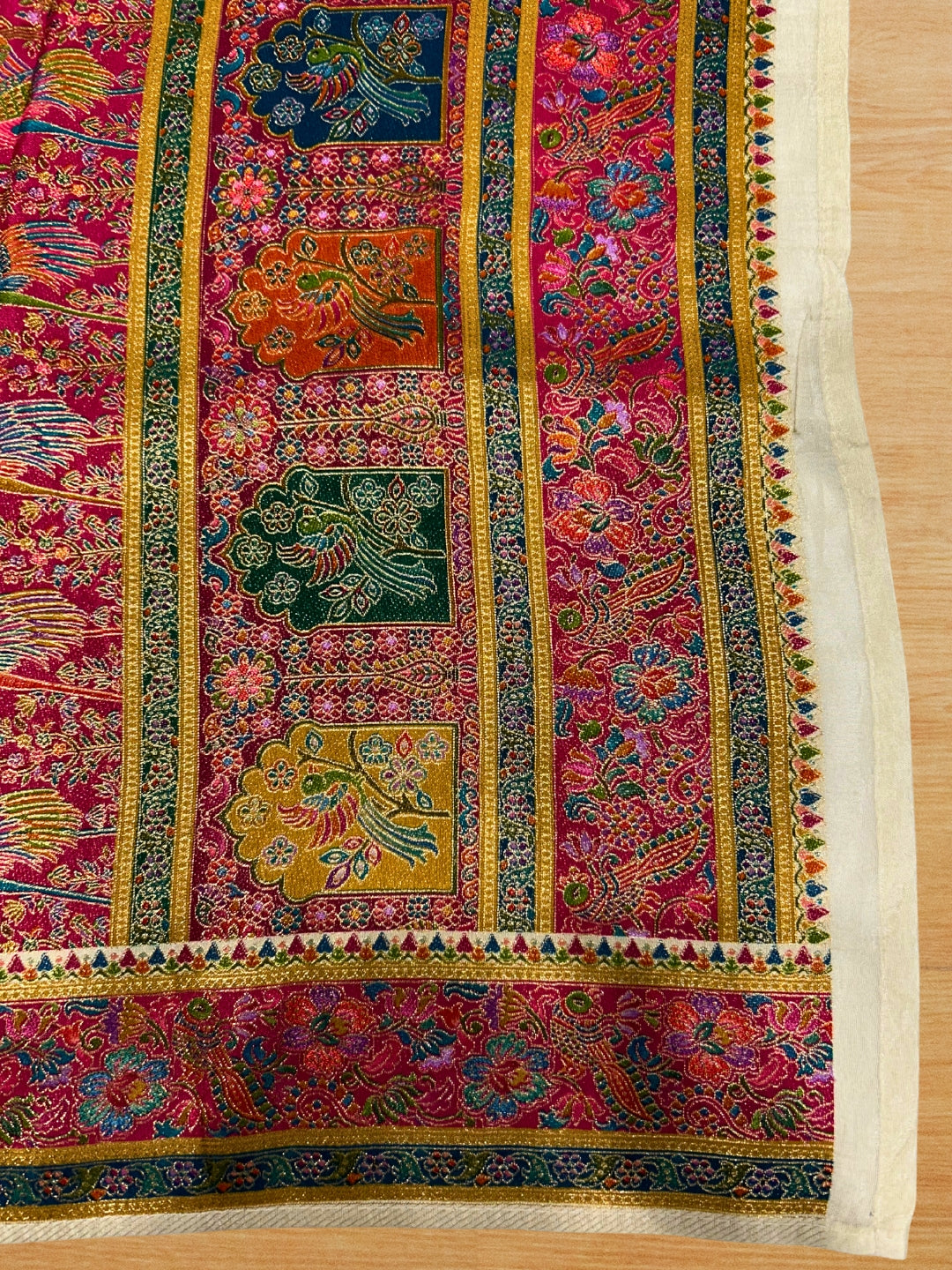 Cream Banarasi Woven Floral Saree with Rani Pink Temple Border and Rich Pallu
