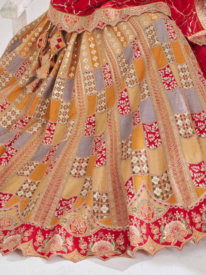 Multi-colour patchwork lehenga choli with mirror, zari & gota embroidery and bandhani dupatta.