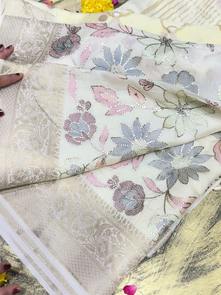 Off White Banarasi Silk Saree with Floral Embroidery and Zari Woven Border