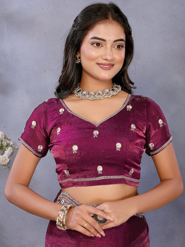 Solid saree with embellished scalloped border and zari-embroidered blouse.