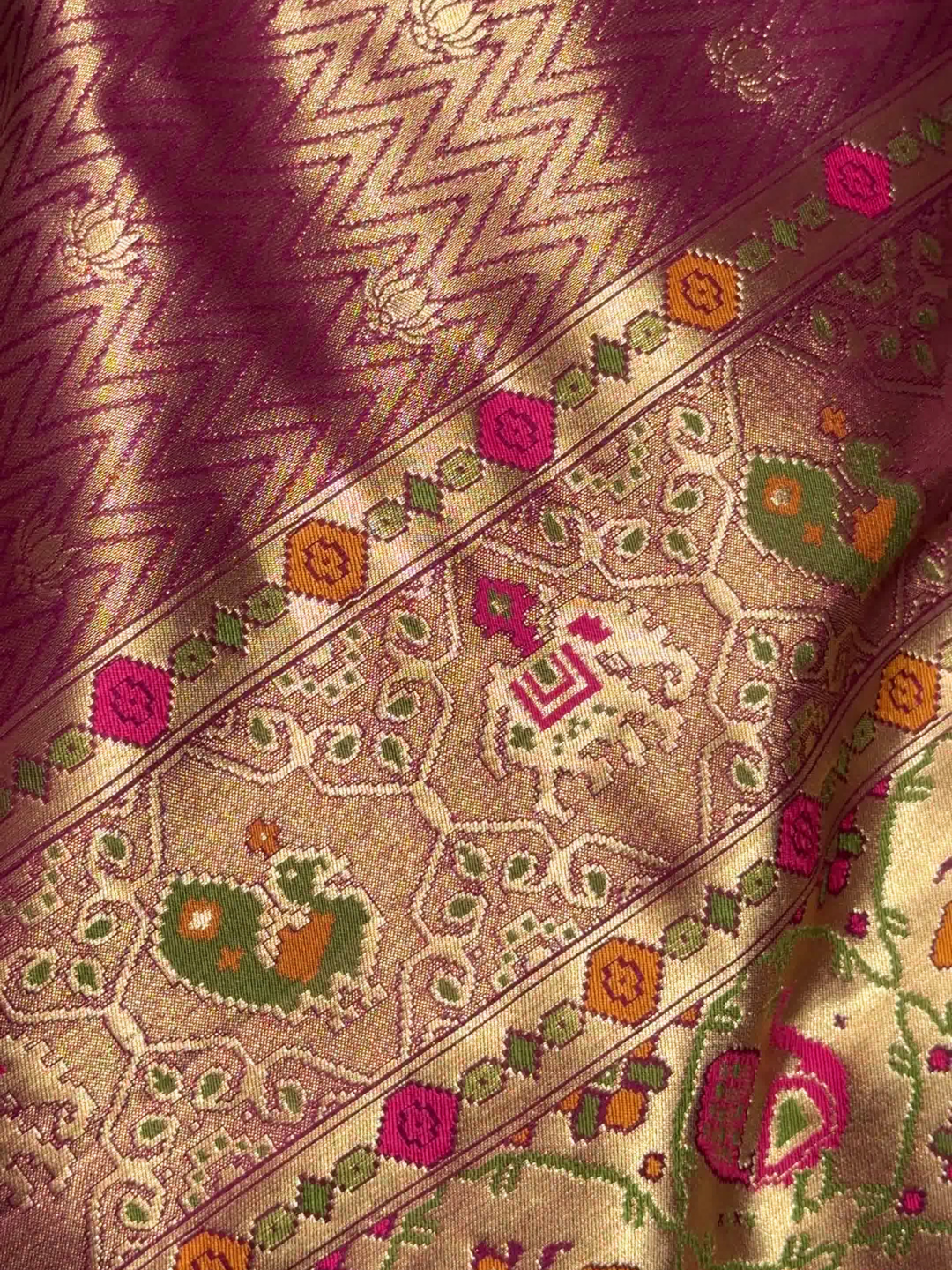 Patola Weave Banarasi Silk Saree with Animal Motif in Magenta