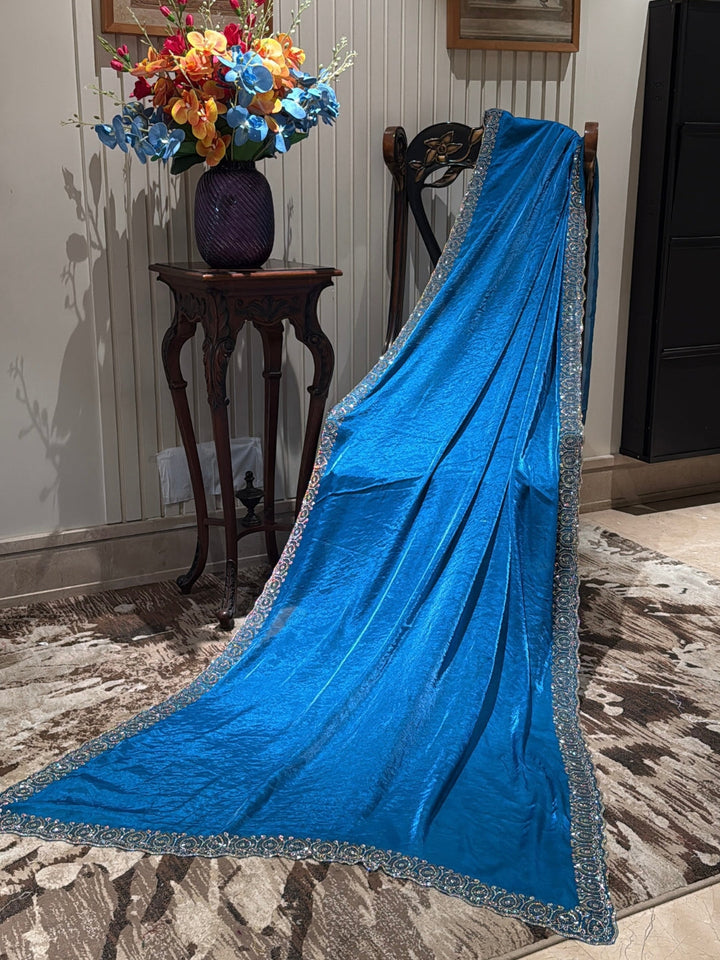 Shimmer Georgette Saree with Intricate Silver-Blue Sequin Embroidered Border