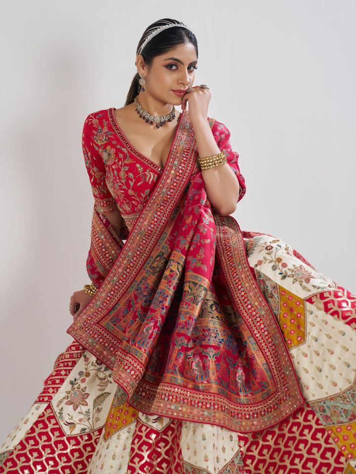 Brocade patchwork lehenga choli with zari, thread embroidery and Banarasi woven dupatta.
