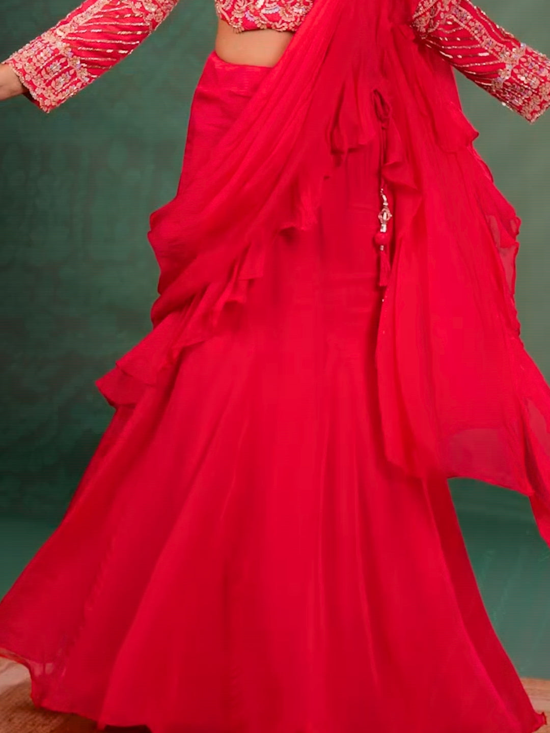 Intricate Embroidery with Floral Motifs & Sequin Detailing Blouse and Ruffled Lehenga with attached Dupatta