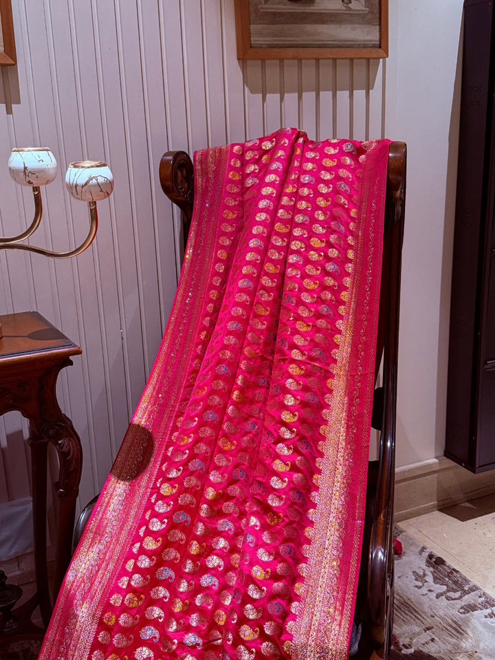 Pink Banarasi Saree with All-over Gold Zari Buta and Dual-Tone Geometric Woven Border