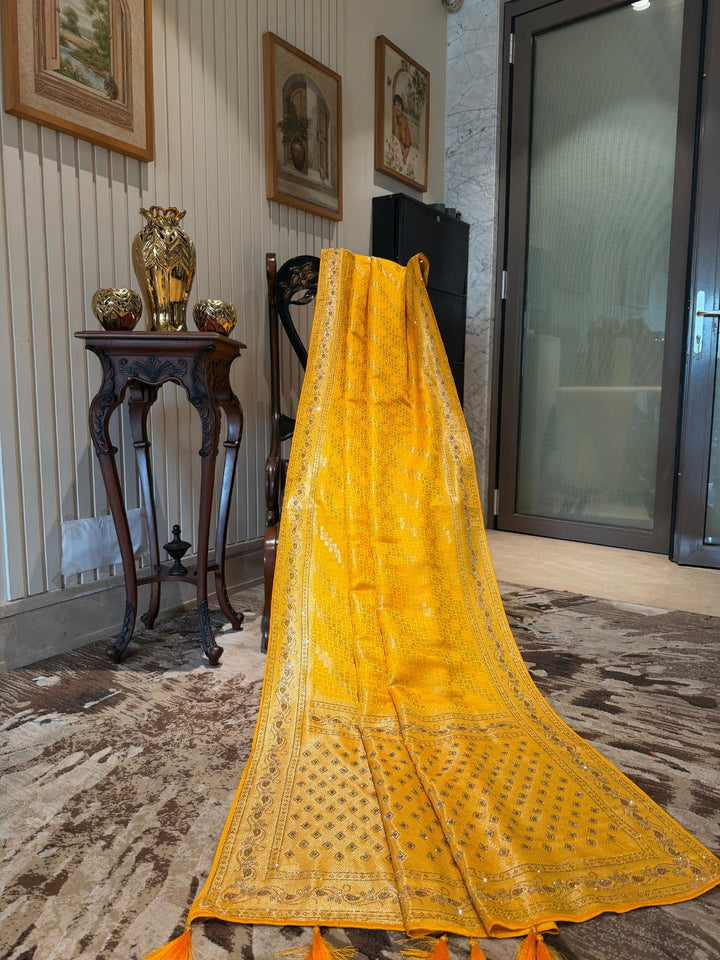 Yellow Banarasi Woven Checks Saree with Intricate Zari Border and Tasselled Pallu