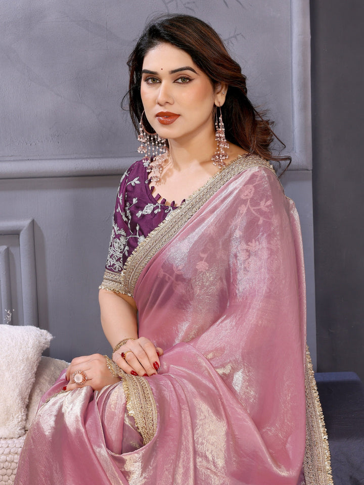 Shimmer solid saree with embellished border & contrast floral embroidered blouse.