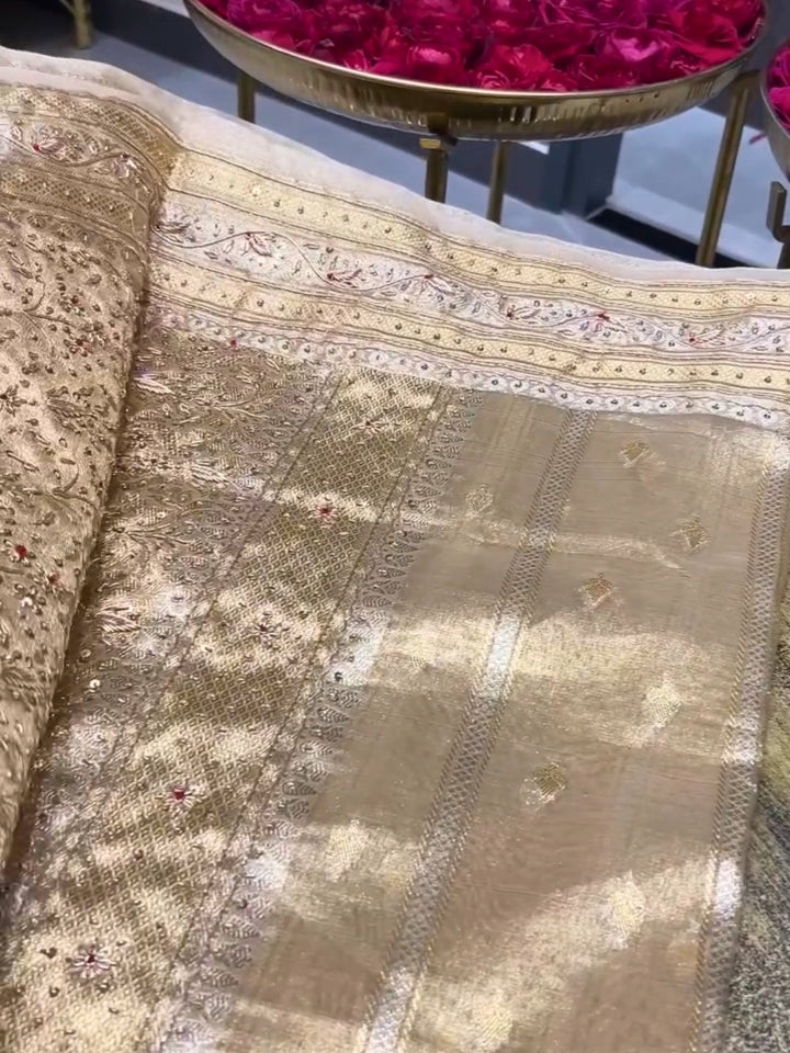 Beige color Beads & Stones Worked Border with Ethnic Motifs Zari woven traditional saree