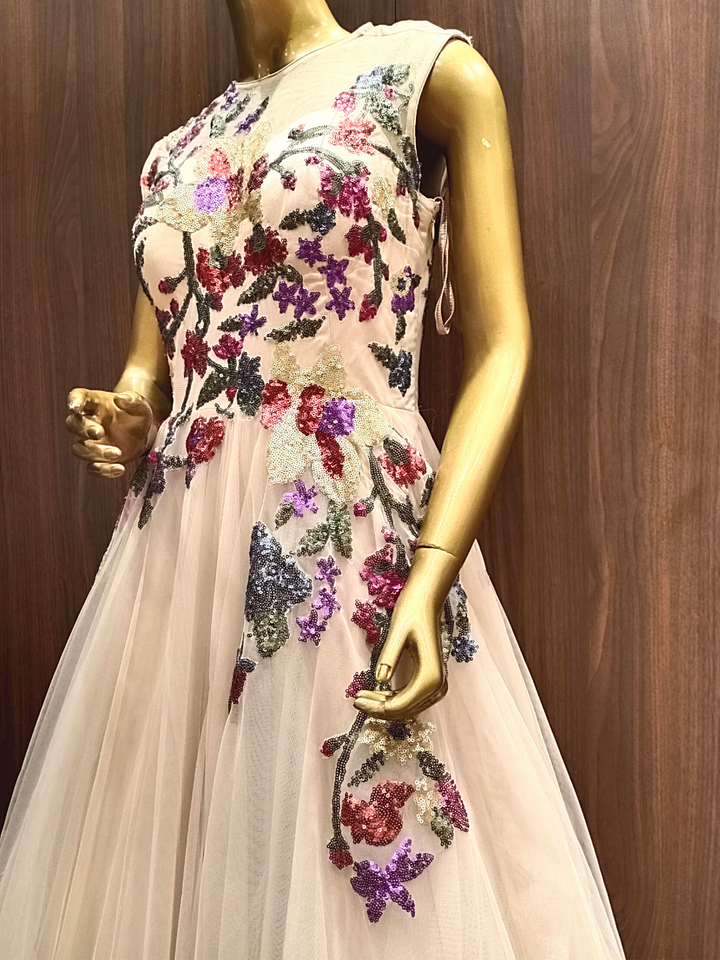 Nude Pink Flared Net Gown With Floral Multicolor Sequin Embroidery