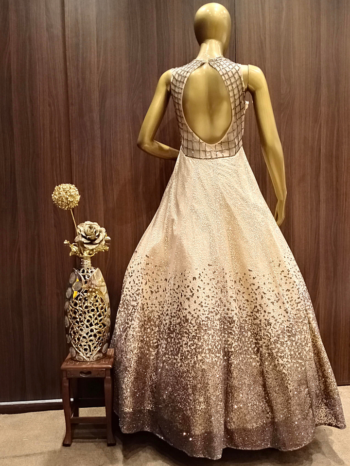 Metallic Beige Sequence Embellished Net Gown with Stylish Geometrical Pattern