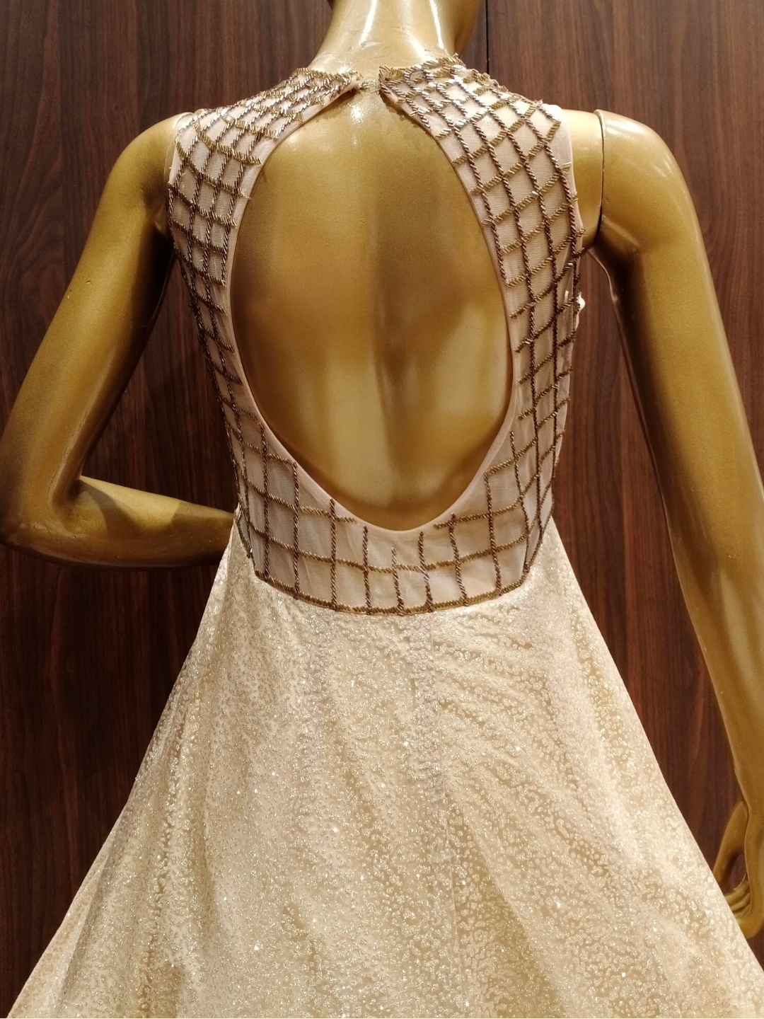 Metallic Beige Sequence Embellished Net Gown with Stylish Geometrical Pattern