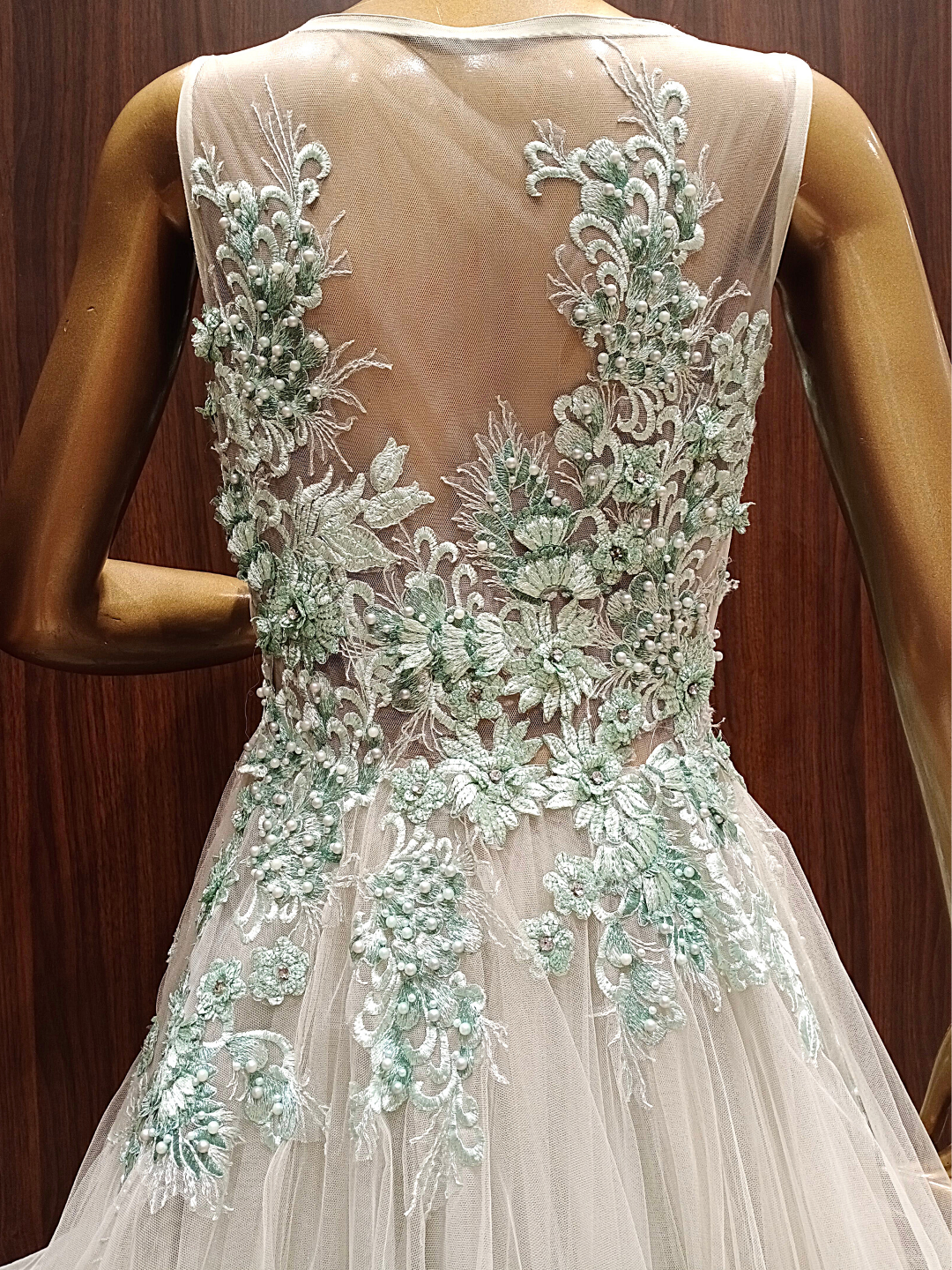 Pastel Green Ruffled Net Gown with Pearl,Thread Embroidery and Layering
