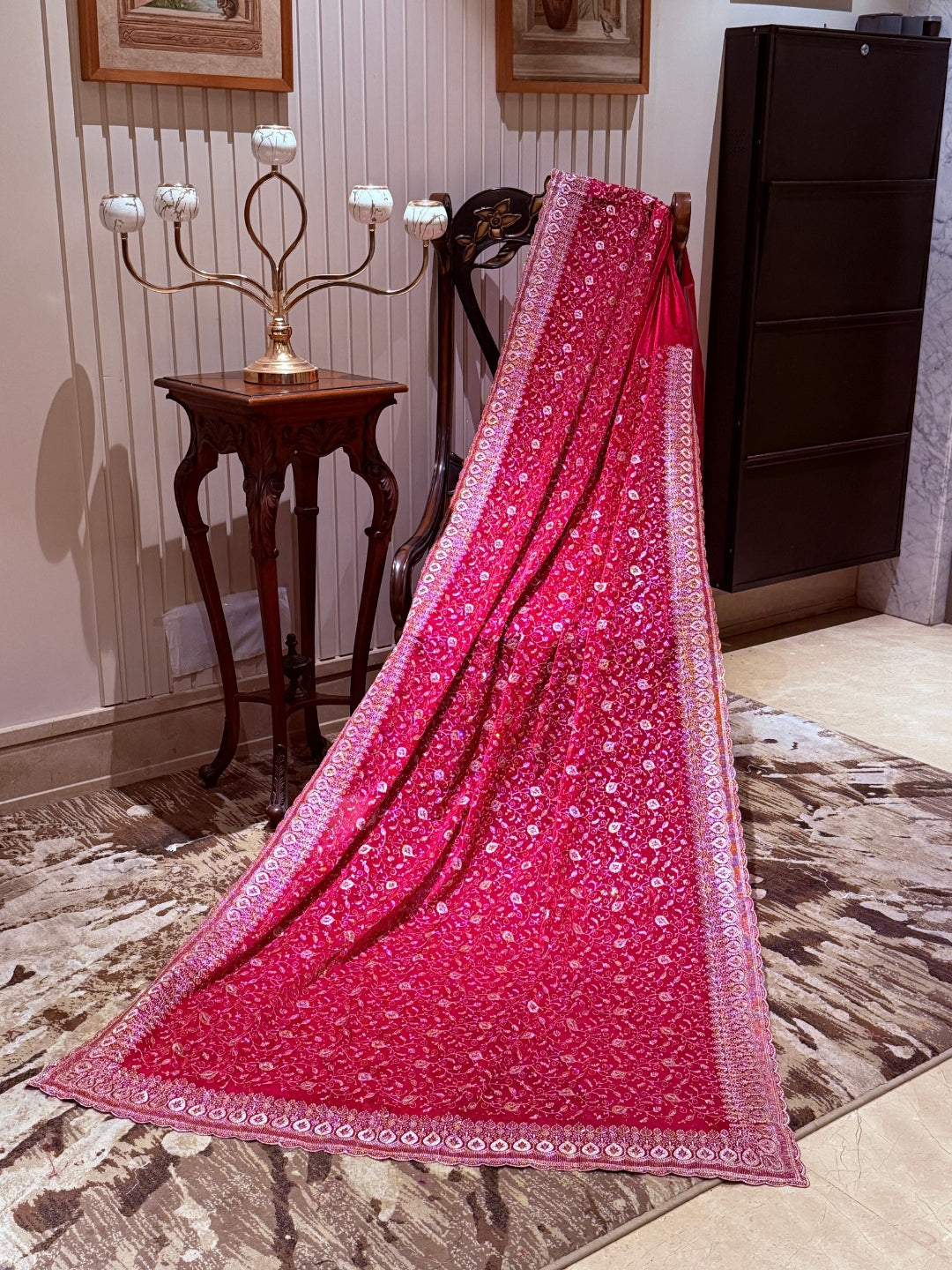 Pinkish Red Saree with Heavy Golden Zari Embroidery & Ornate Floral Motif Border Work