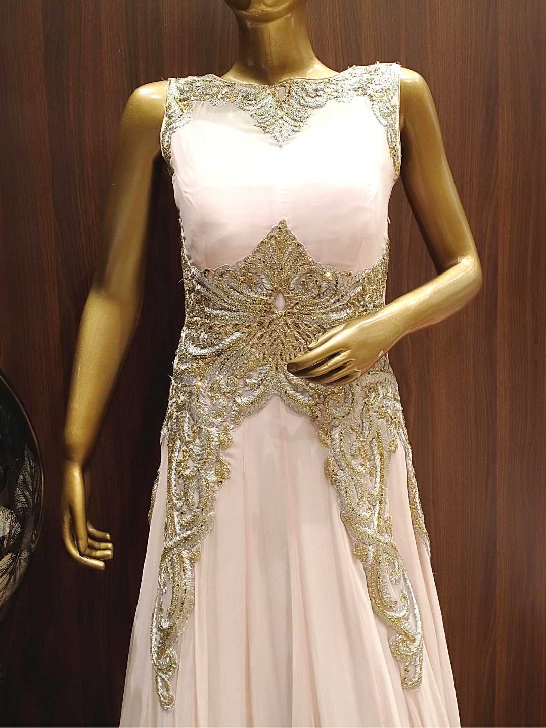 Ivory Pink Flared Gown With Stylized Back and Metallic Gold, Silver Thread Embroidery