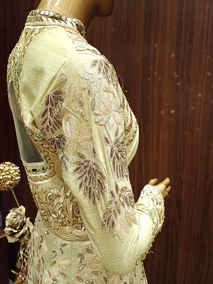 Pastel Green Mirror Embellished Raw Silk Anarkali with Resham embroidery in Ethnic Pattern