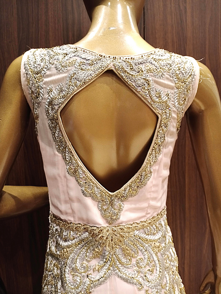 Ivory Pink Flared Gown With Stylized Back and Metallic Gold, Silver Thread Embroidery