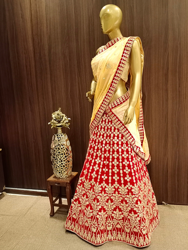 Heavy Ornate Semi-Stitched Bridal Lehenga with Gold Zari Embroidery and Contrast Embroidered Dupatta