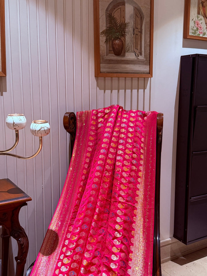 Pink Banarasi Saree with All-over Gold Zari Buta and Dual-Tone Geometric Woven Border
