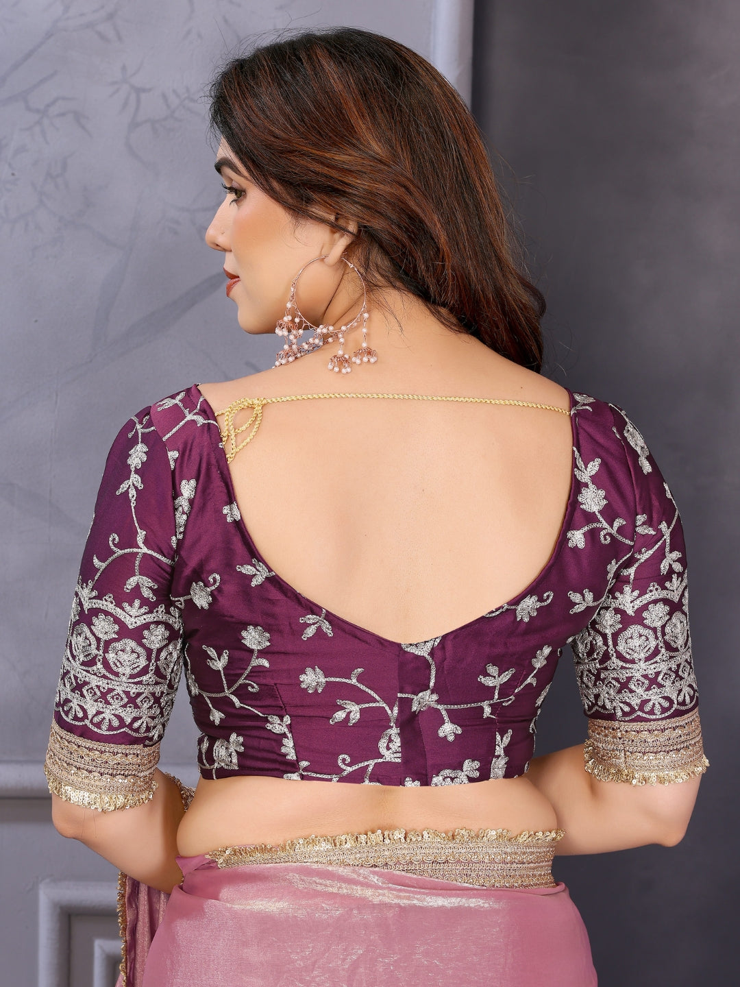 Shimmer solid saree with embellished border & contrast floral embroidered blouse.