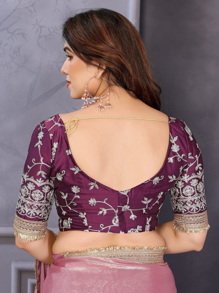 Shimmer solid saree with embellished border & contrast floral embroidered blouse.