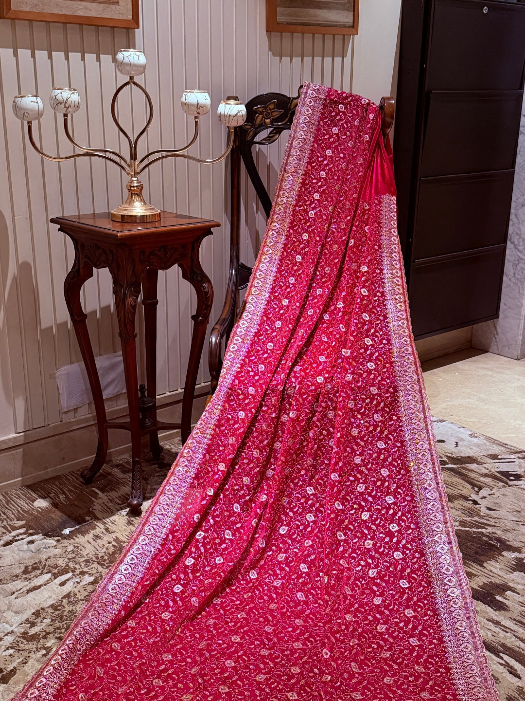 Pinkish Red Saree with Heavy Golden Zari Embroidery & Ornate Floral Motif Border Work