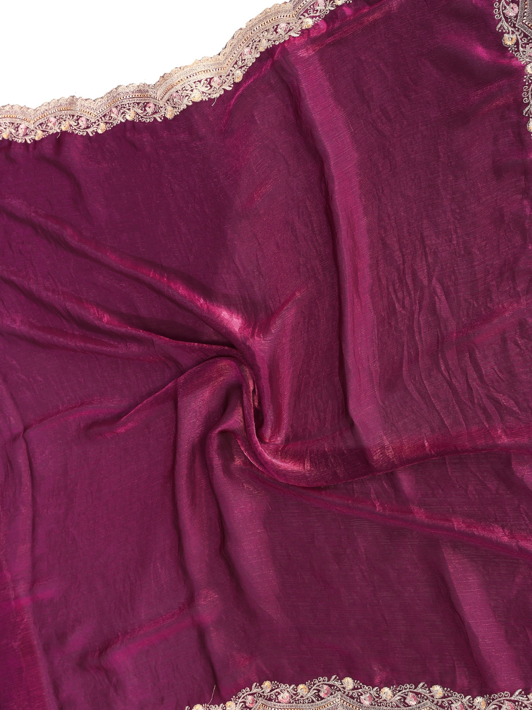 Solid saree with embellished scalloped border and zari-embroidered blouse.